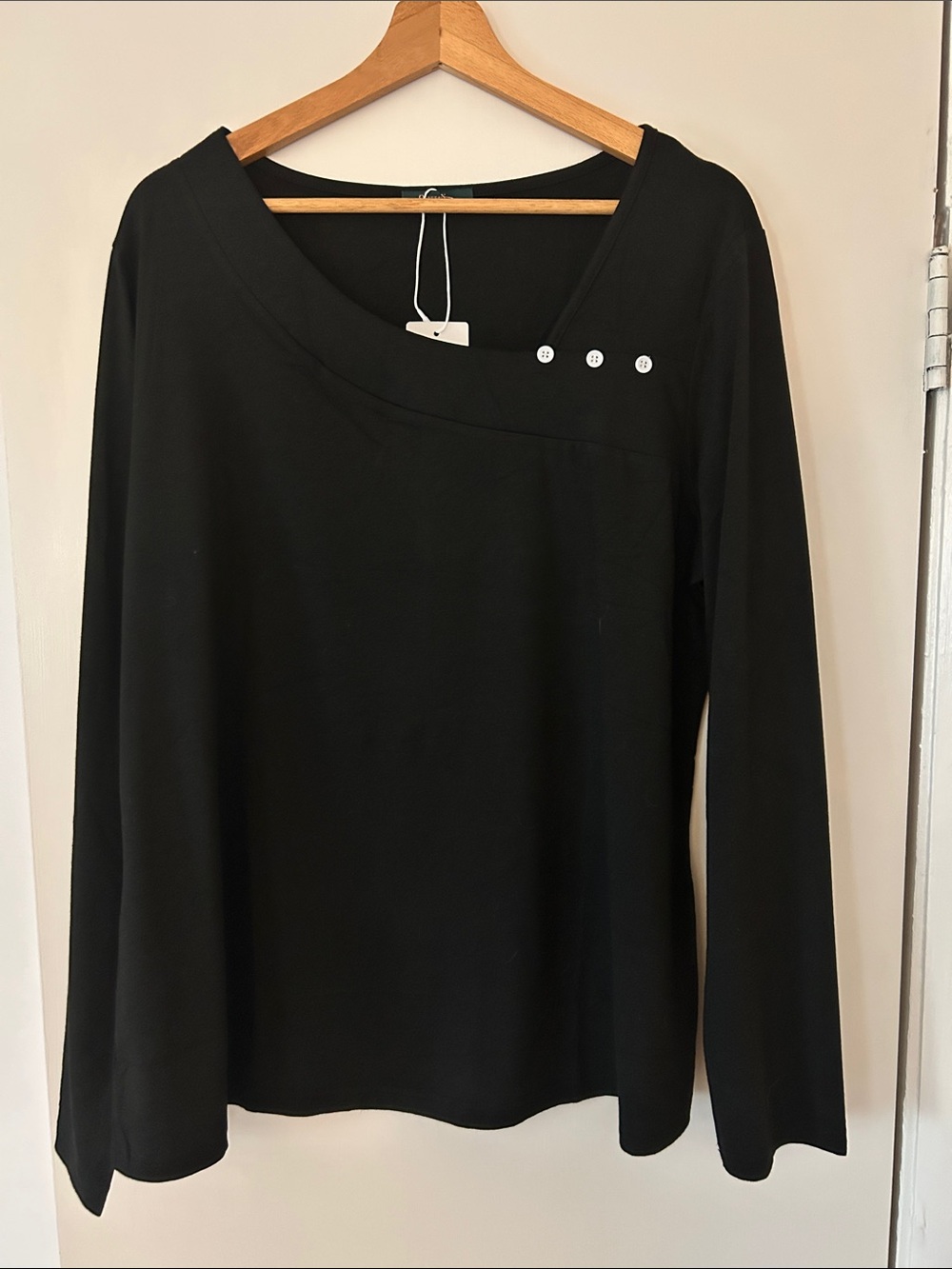 Classic Black Long-Sleeve Top with White Accent Buttons